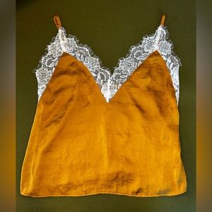 Light lacy deep V tank.